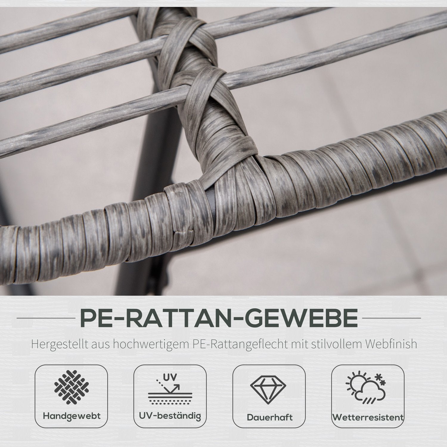 Avkopplingsstol i rotting utomhus med fotpall och gråa kuddar