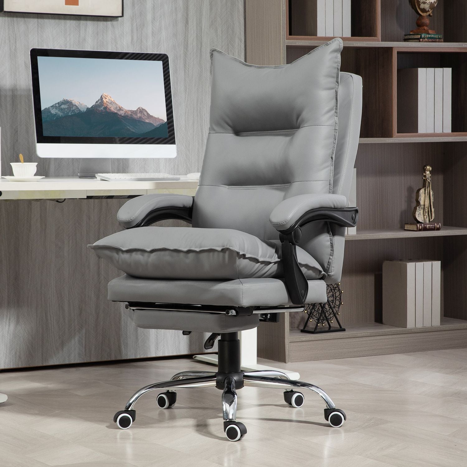 Ergonomisk kontorsstol med fotstöd, liggande och vadderat