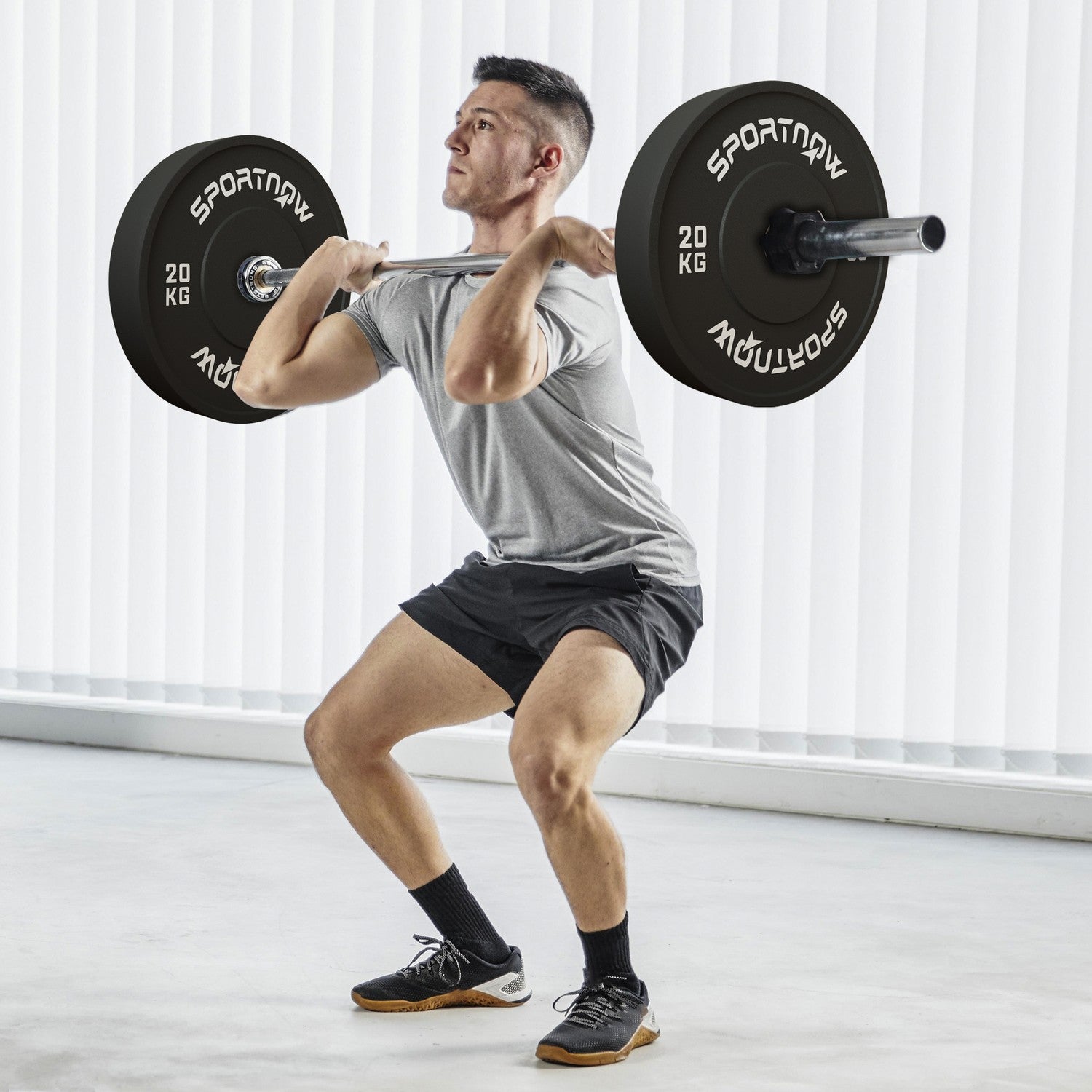 Ett par 20 kg hantelvikter, svart, 50 mm hål