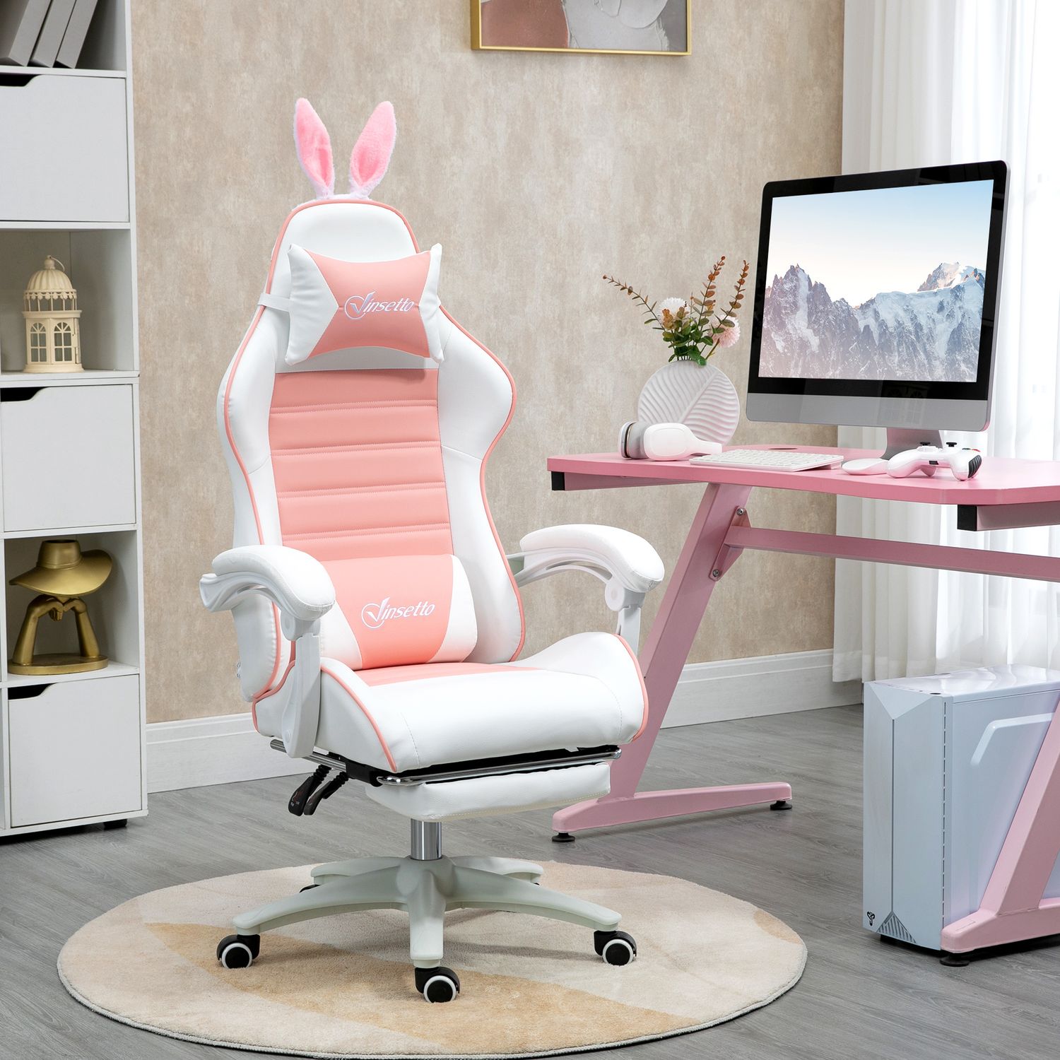 Rosa ergonomisk spelstol med svankstöd och fotstöd
