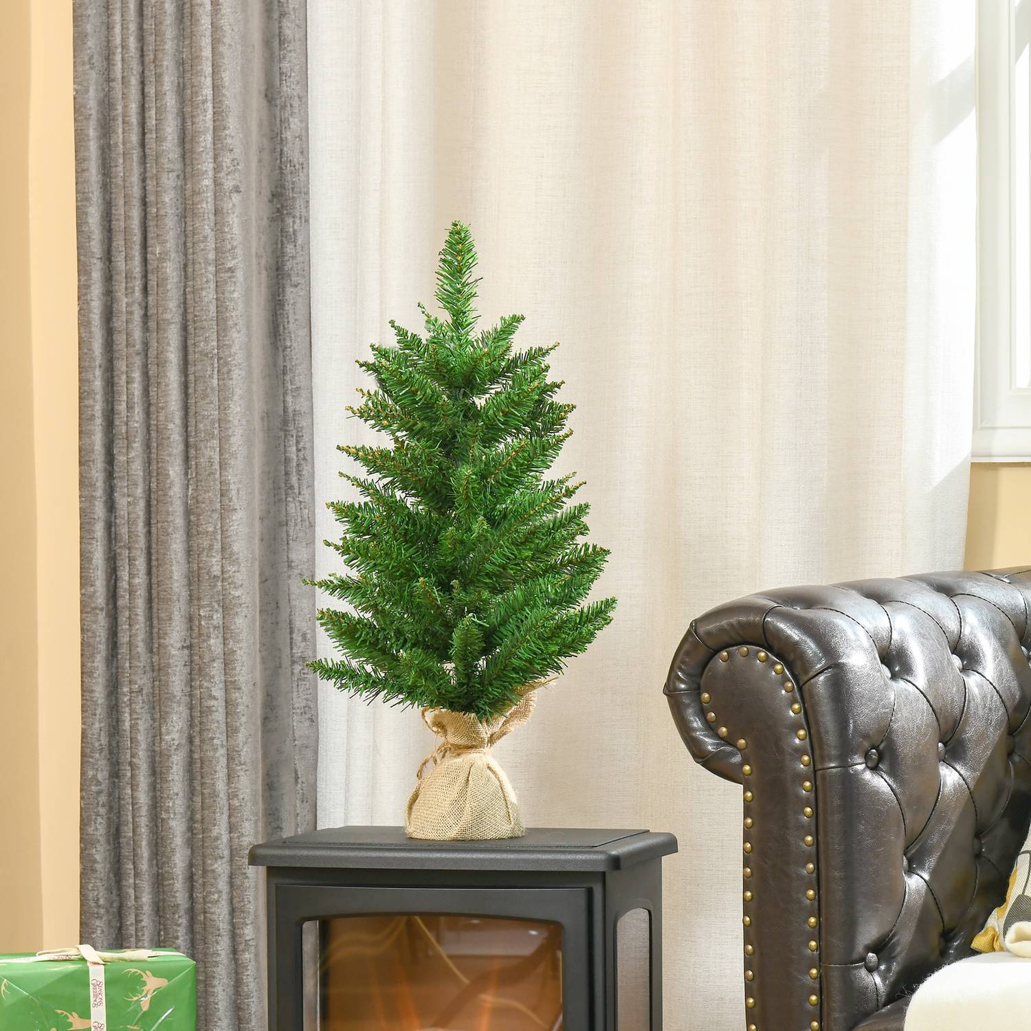Kleine kunstmatige kerstboom van 60 cm voor op tafel, linnen voet