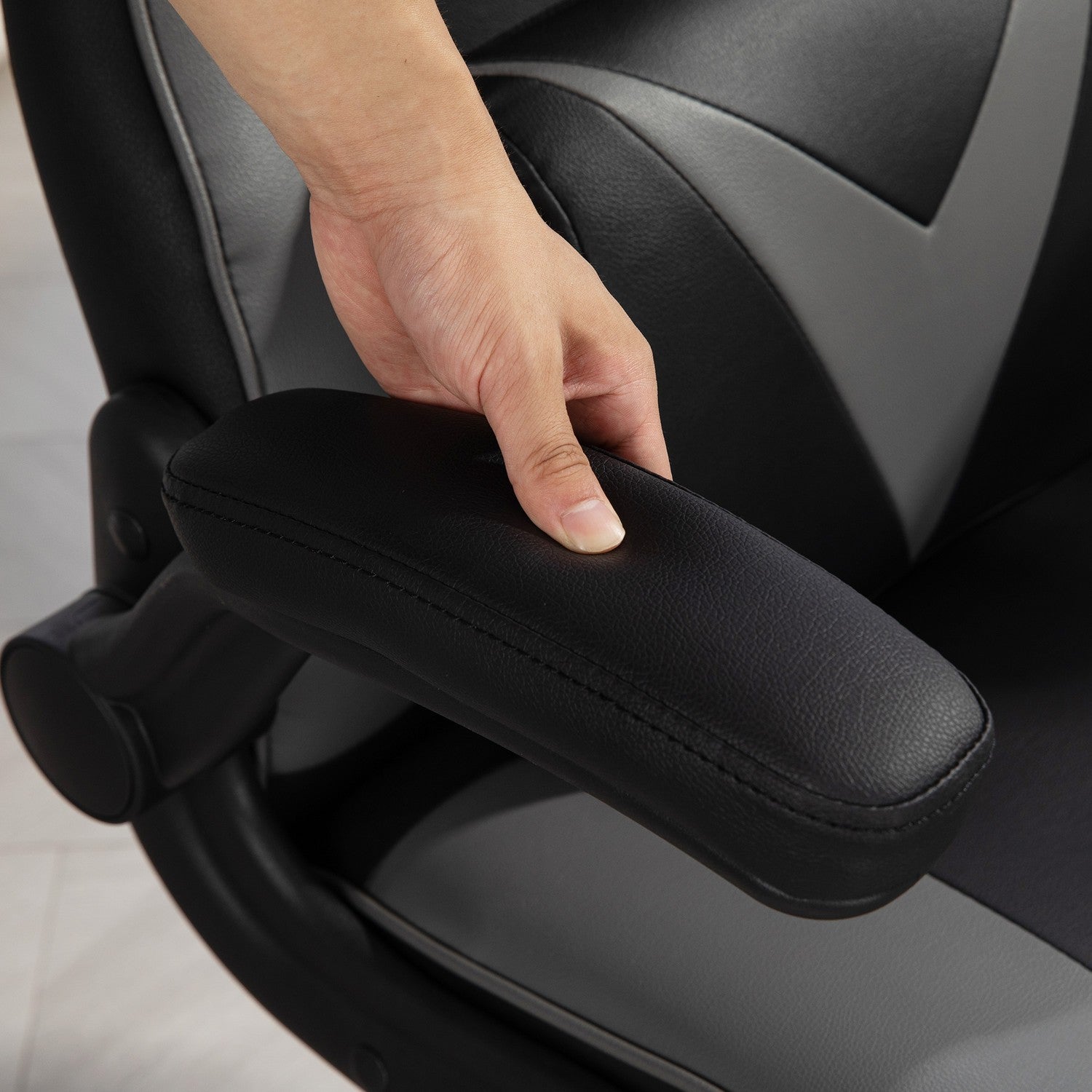 Ergonomisk spelstol med rocker & svankkudde, svart/grå