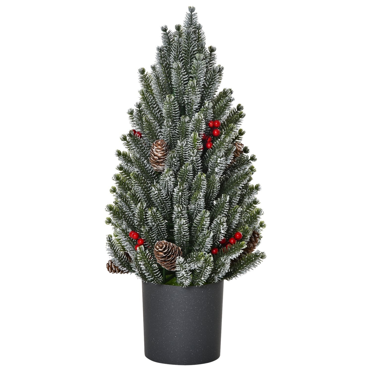Snötäckt bordsjulgran med bär och tallkottar