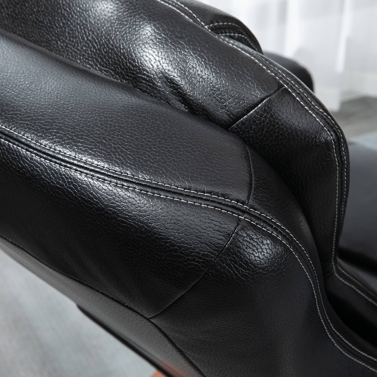 Liggande avkopplingsstol i konstläder med osmansk, svart