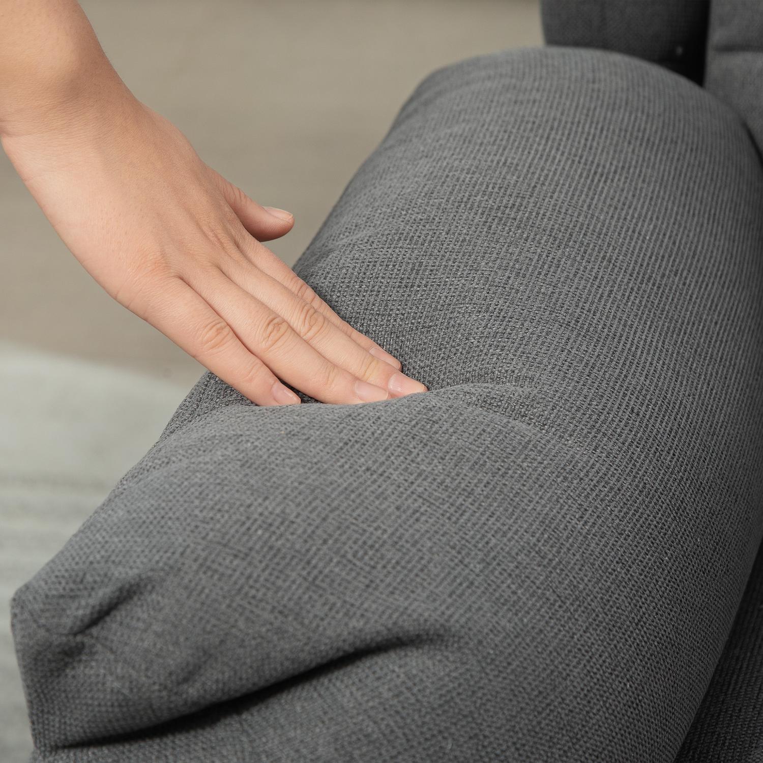 Mörkgrå vilstol med fickfjäderkärna, kapacitet 150 kg