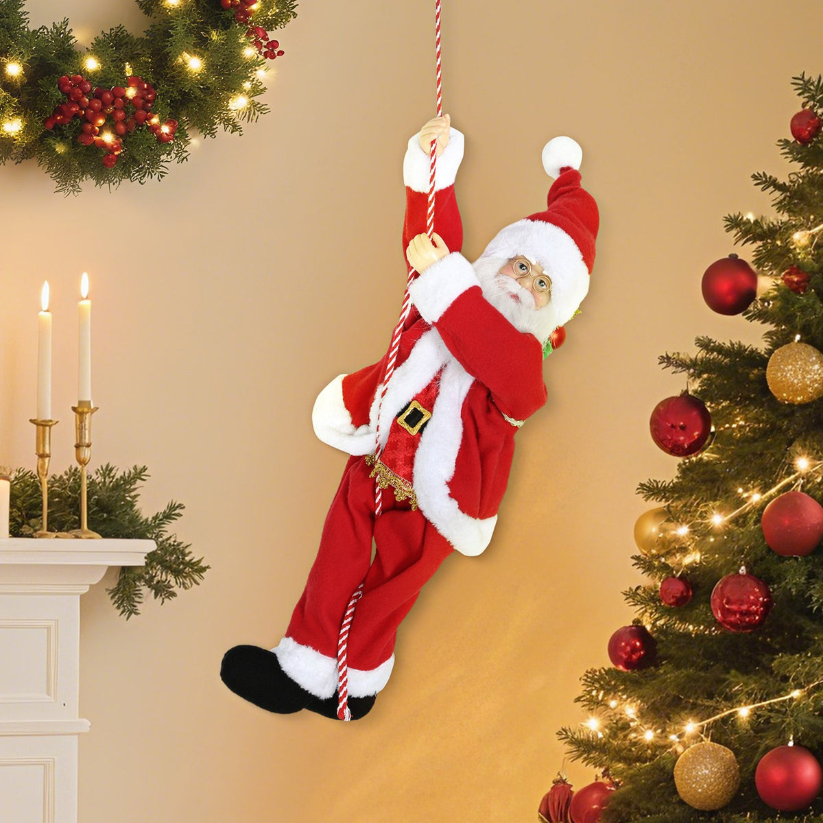 Klimmende zingende kerstman van 60 cm met cadeau en geluid
