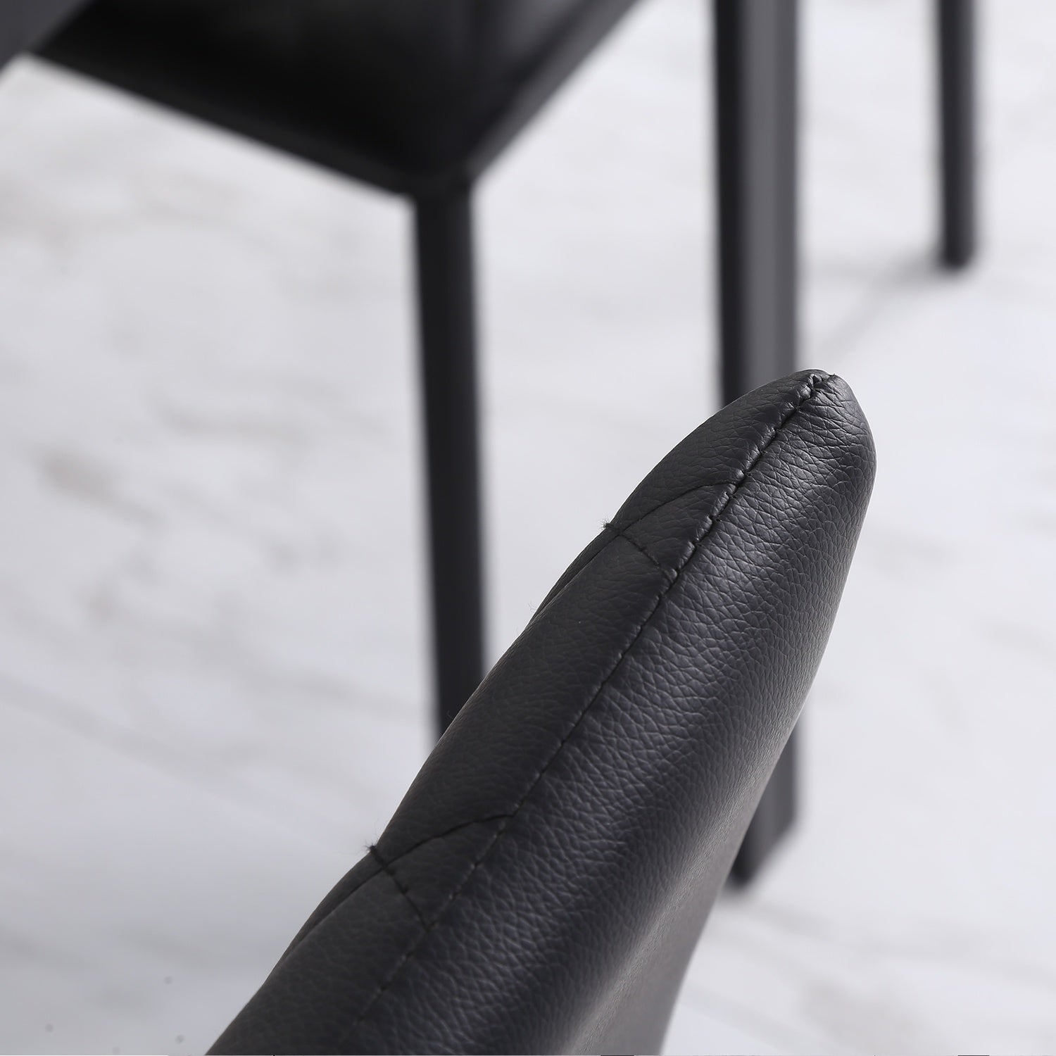 Svarta matstolar i konstläder, set om 4, stålben, vadderade