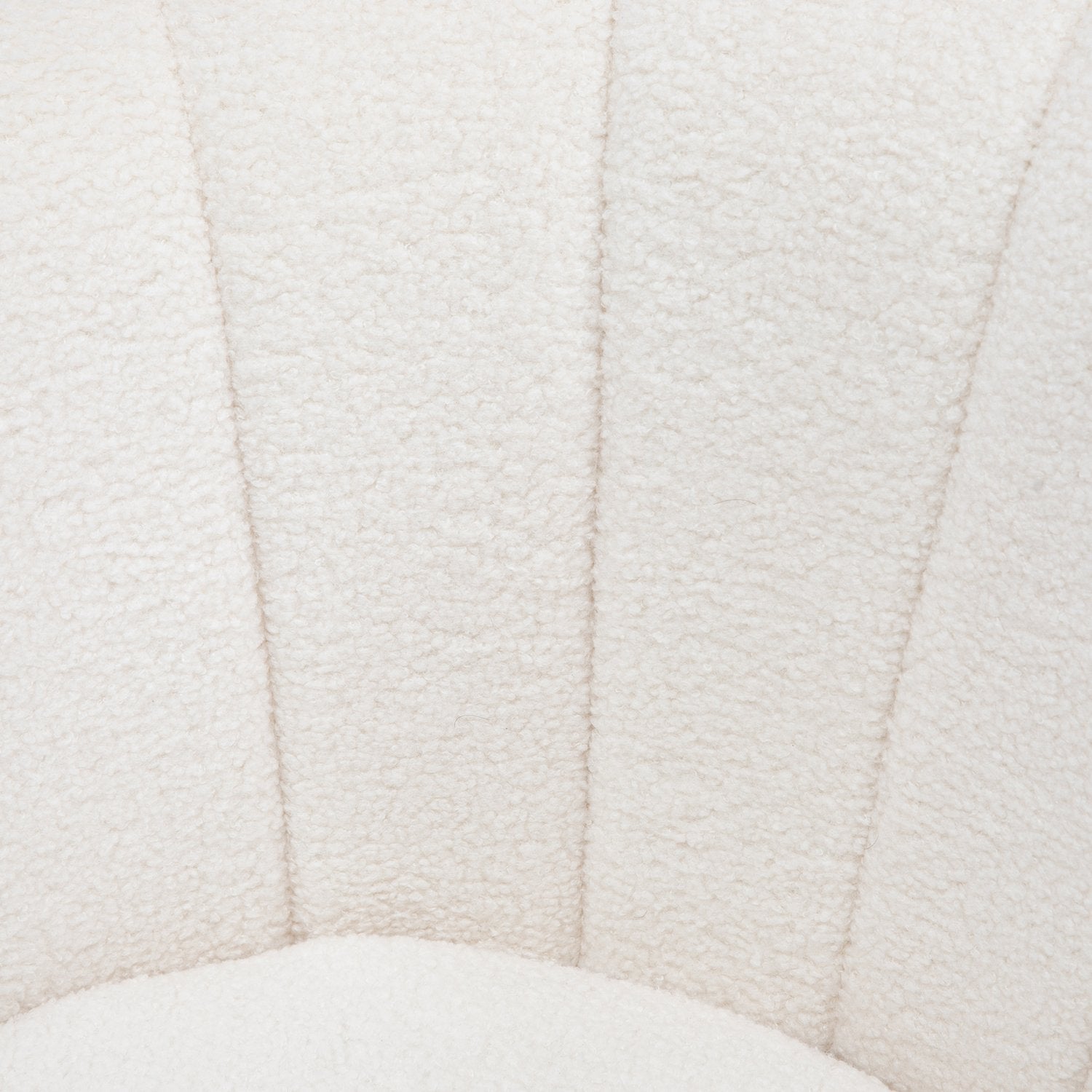 Vit skalklädd fåtölj med metallben