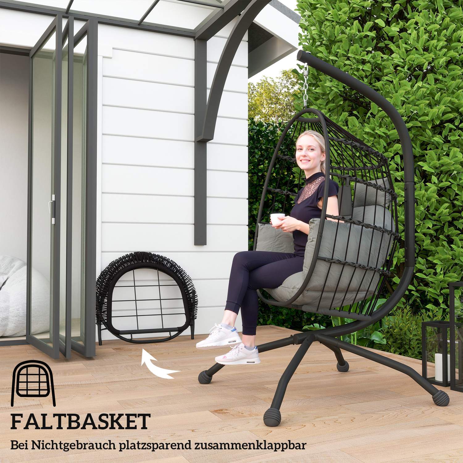 Äggformad hängstol med mugghållare, svart